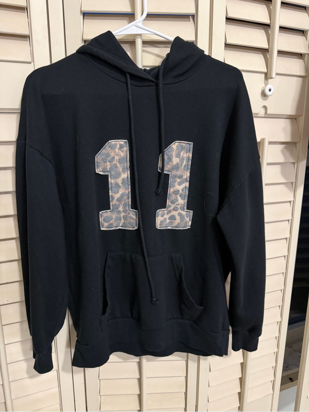 PacSun Black Hoodie with Leopard '11' Appliqué